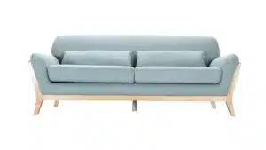 canapé vert et bois clair pour une déco Japandi